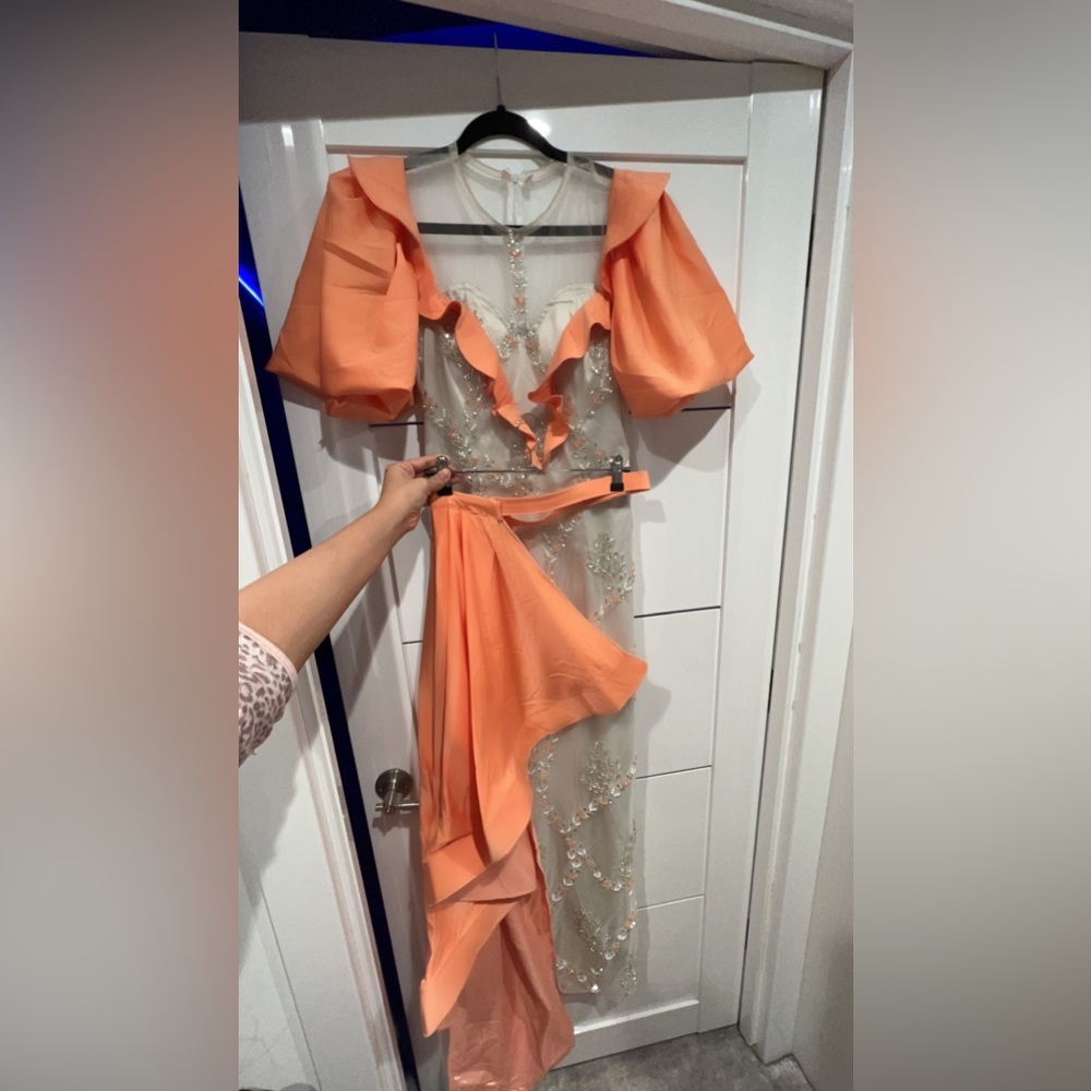 Custom made dress looks new I only wear it one time no tag very nice fabric